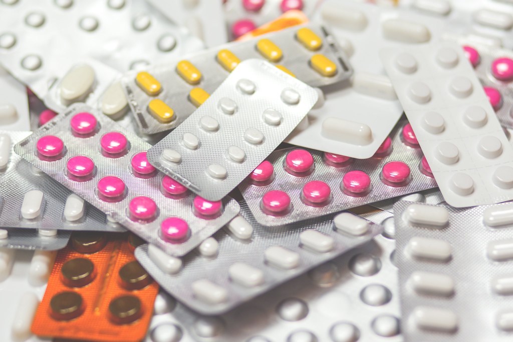 Tablets and a blister pack of medication, the kind of over-the-counter drug that affects the IMSAFE medication check