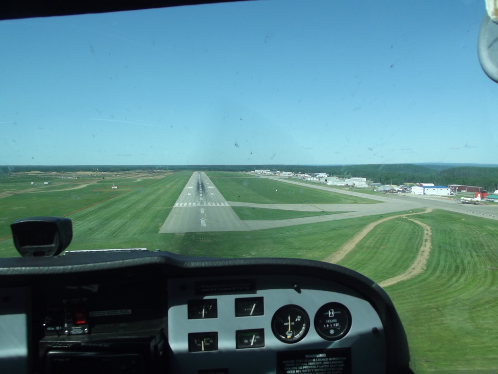 A Cessna 172 trainer parked on a flight-school ramp