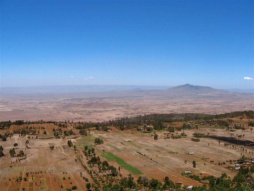 A dramatic escarpment and valley landscape